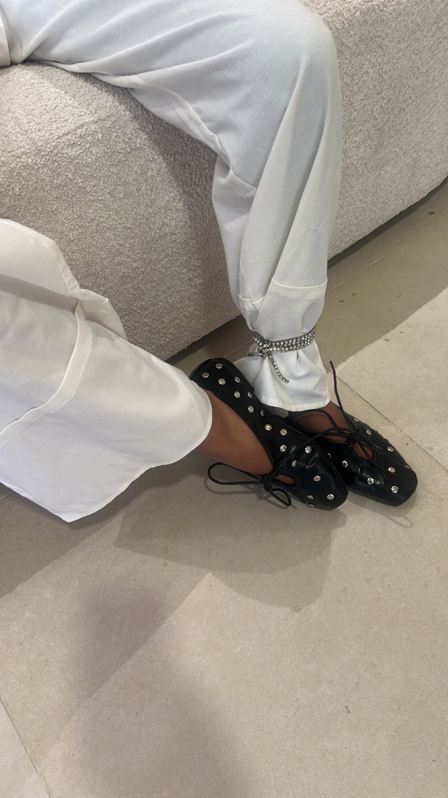 Studded black ballerinas